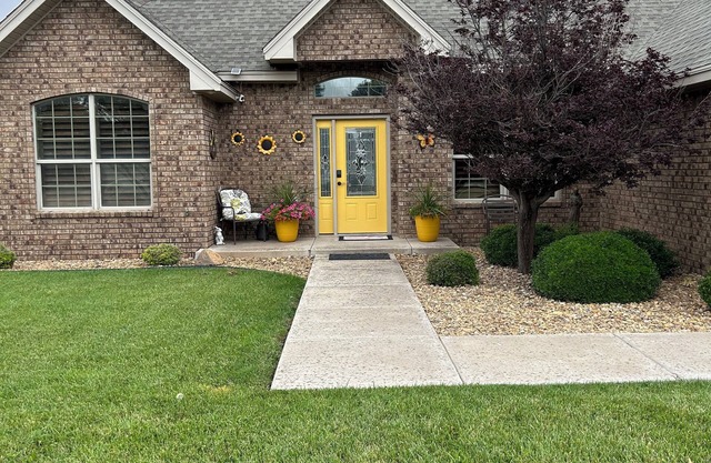 Sunshine Retreat with a game room, 4 bedrooms, and pet friendly.