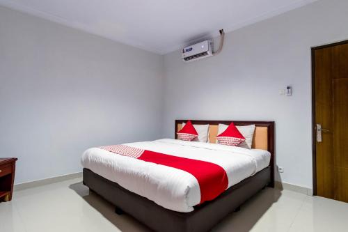 Super OYO 283 Helvetia Residence