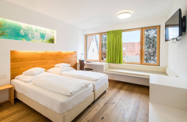 Habitación superior con ducha.