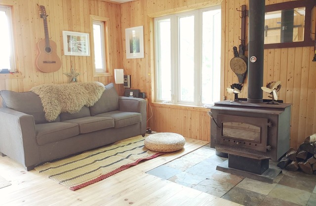 Sweet and cozy cottage nestled in the heart of a serene 10-acre woodland!