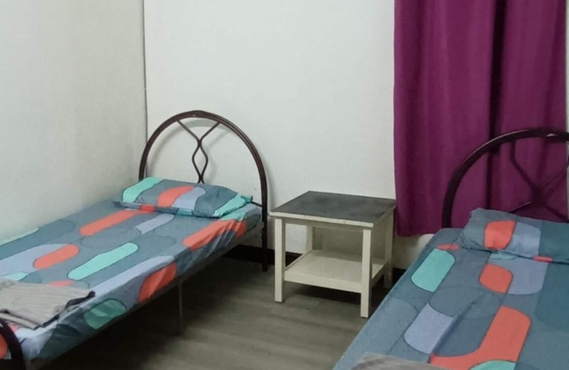 Taman Putra Perdana Budget Apartment with AC-WiFi-Cooking