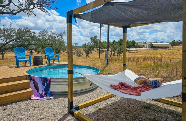 Texas Hill Country cabin with stock tank pool & porch with amazing views