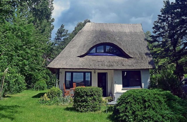 Casa con techo de paja Residencia de vacaciones