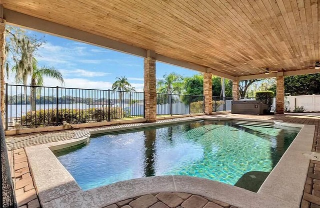 The American Dream House – Lakefront Luxury with 2 Heated Pools & Hot Tub