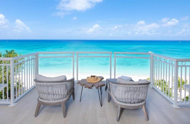 The Beachcomber - Oceanfront Penthouses by Grand Cayman Villas & Condos