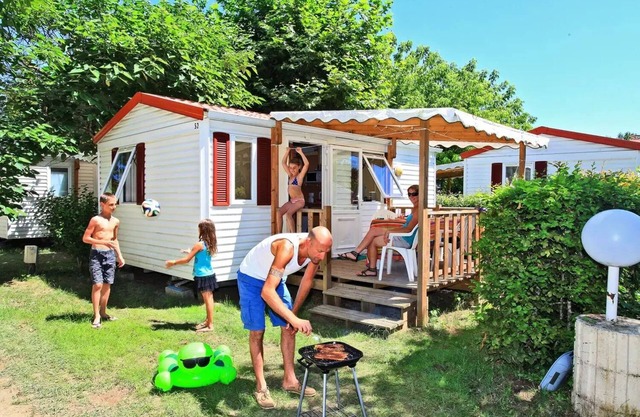 Camping Le Plein Air des Bories *** - Mobil home Super Venus 3 habitaciones 4 personas