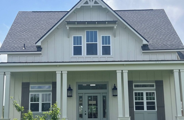 The carriage house/cottage house. Large expansive open floor plan