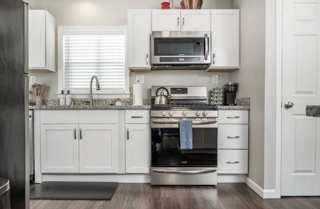 The Concord Cozy · Remodeled Home w/ King Bed, Bunk Bed, & Yard Games