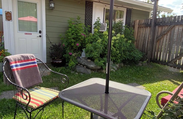 The Cottage is central but still a quiet delight. Lovely back yard!