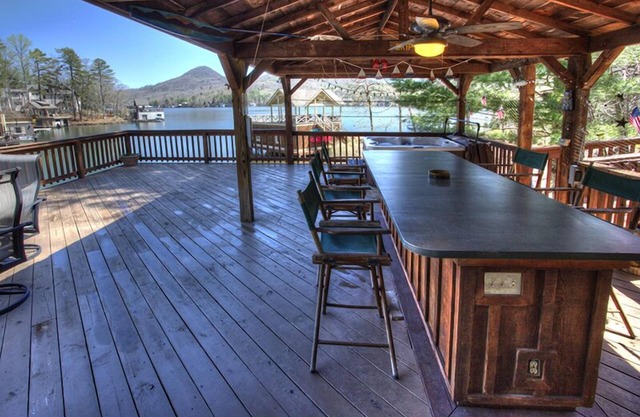 The Cove at Lake Burton | Vintage Lakefront Home with Covered Boathouse Deck
