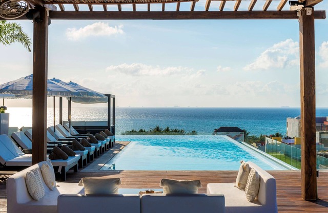 The Fives Downtown Hotel - Curio Collection by Hilton