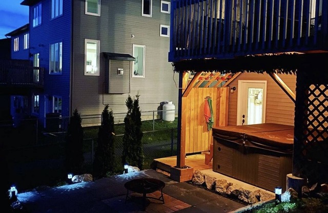 The Governor's Suite - An executive oasis featuring a hot tub, fire pit and BBQ!