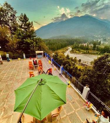 The Hollywood Classic, Manali - A hotel facing towards snow capped mountain & river