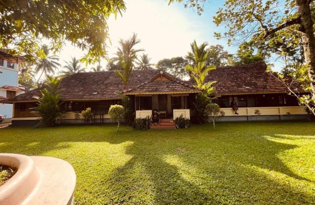 The Kerala Heritage Villa on the shore of Backwaters - Pamba River Alleppey
