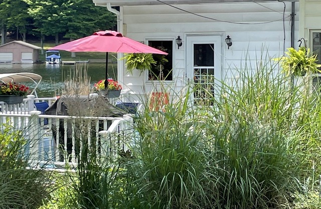 The Lake house is a beautiful house within 20’ of Hamlin Lake. Beautiful views.