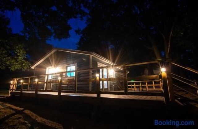 The Little Blue Cottage at School Section Lake