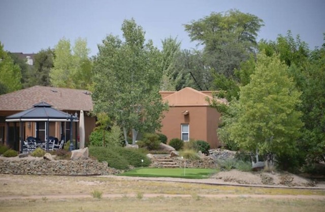 The Little Bunkhouse is on 7 acres of walk ways, a camp site and putting green.