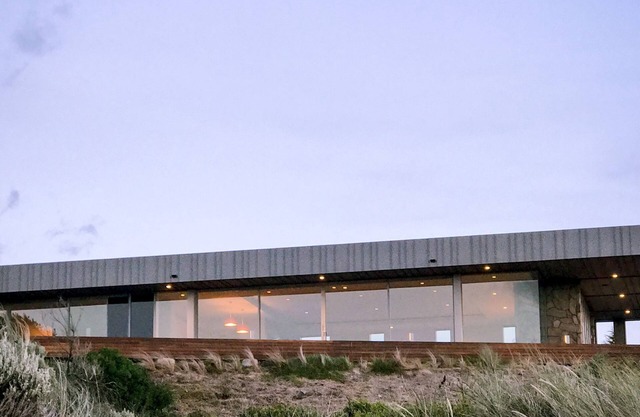 La casa de playa baja cabeza