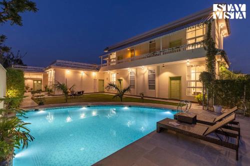The Pastel Courtyard with Pvt Pool & Garden at Jaipur by StayVista