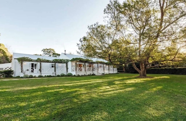 The White House | Bold Berry Farmhouse with Pool