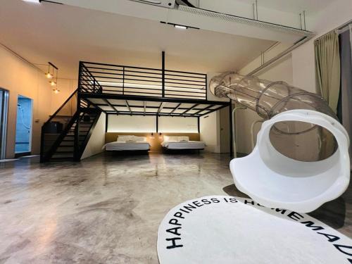 the Zwei Playhouse Retreat with Slide at the Frohaus