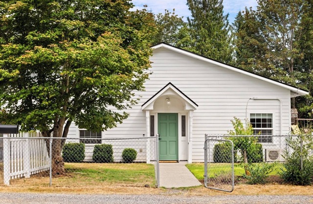 This cottage offers a spacious layout ideal for relaxing or working remotely.