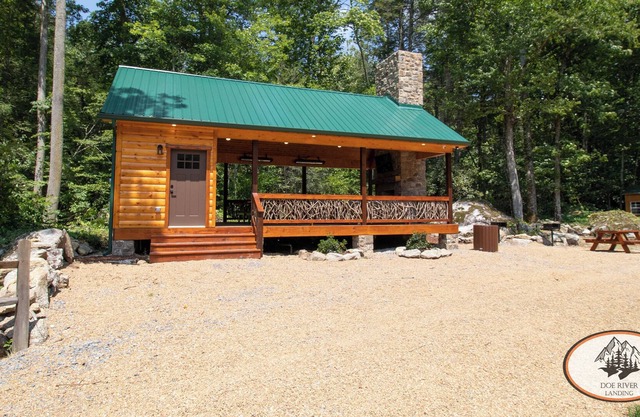 This riverfront event pavilion touts scenic Roan Mt. views & LOADS of amenitie for your gathering!