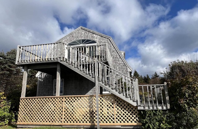 This spacious 2nd floor garage apartment offers phenomenal open ocean views!