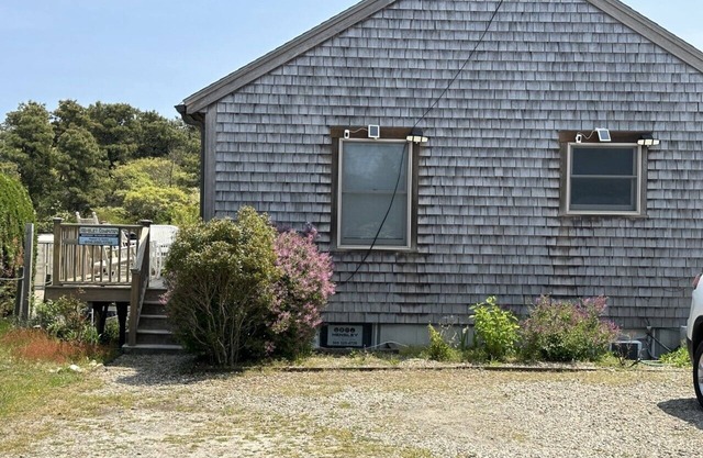 This two-bedroom cottage features one queen bed, two twin beds, and a sofa bed.