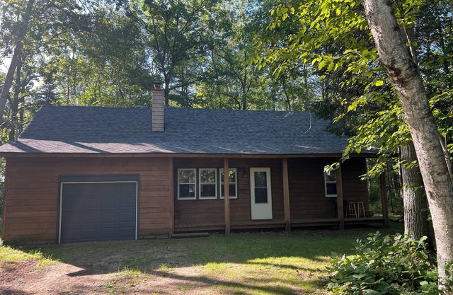Three bedroom Pet friendly Cottage in the woods Birch Lake. Hiking and biking