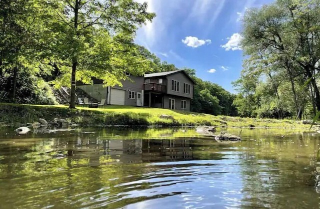 Timber Coulee Creek in backyard, king size bed, grill on deck, large garage.
