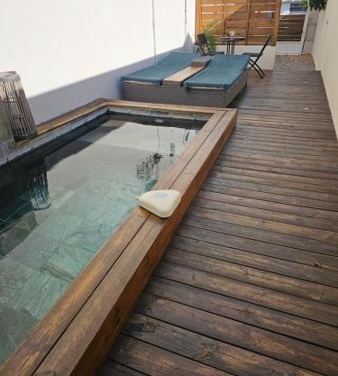 Tiny Badamier Blanc appartement 4 étoiles 2 à 4 personnes piscinelle chauffée
