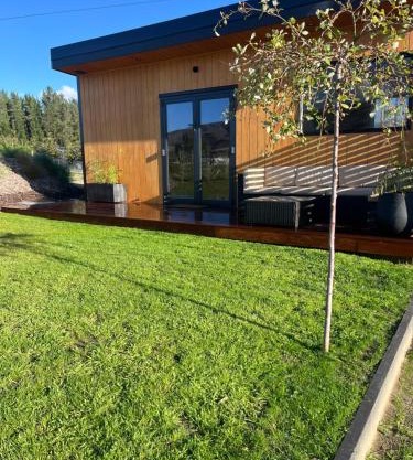 Tiny home with mountain and orchard views