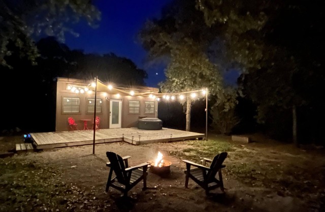 Tiny House for two nestled under massive oaks in Southern Oklahoma.