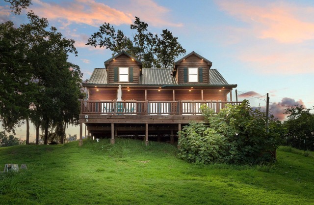 Toledo Bend Log Cabin - a estrenar, frente al lago - observe las puestas de sol en 3 millas