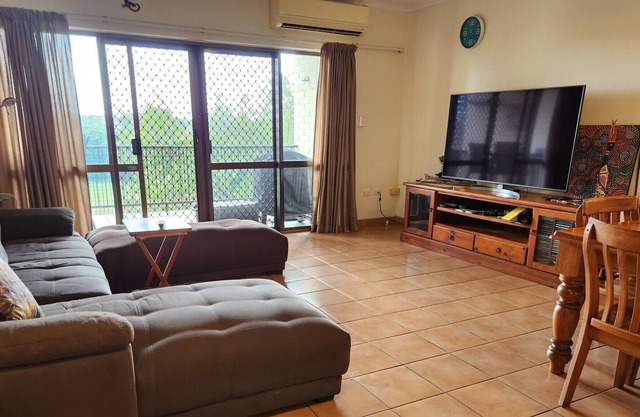 Top Floor Apartment Close to City and Beaches With Sweeping Golf Course Views