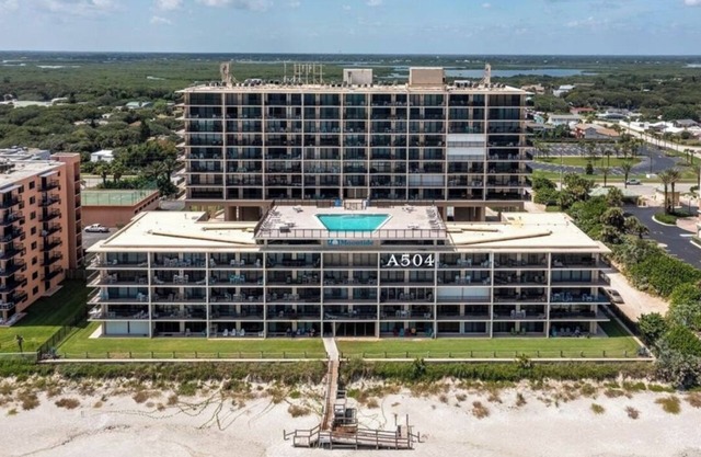 Top floor beach front suite with 27' balcony & rooftop pool.