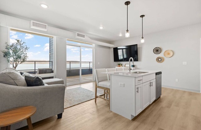 Top floor unit with huge patio overlooking Lake Pepin - Assigned Garage - Unit 303