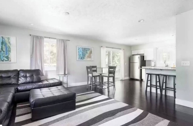 Torch Lake 4 bedroom home w/ large yard & parking