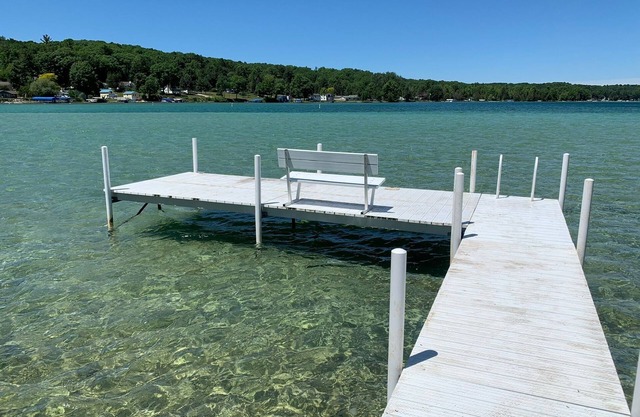 Torch Lake Oasis: Serene Views & Waterfront Bliss Await!