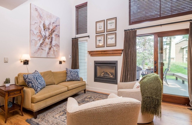 Townhome with Patio, Decked Area with Outdoor Furniture, and Outdoor Grill