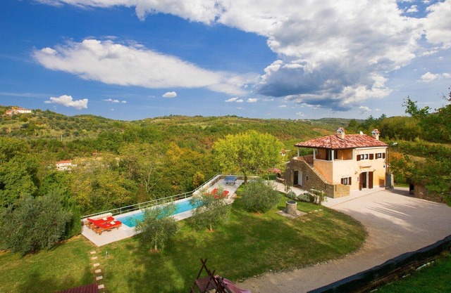 Villa Momiano / Traditional Villa Momiano with a swimming pool
