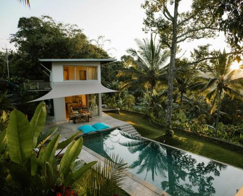 Trails, waterfalls & chill in private jungle lodge