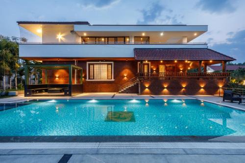 Tranquil Arcadia by StayJadePool6BHKLuxurious
