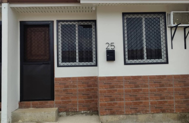Tranquil bungalow with AC in Ormoc City you can relax and enjoy.