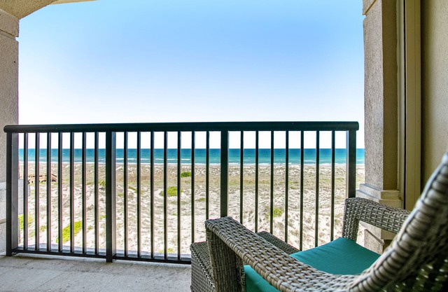 Tranquil coastal home with ocean views, beach access, balcony & shared pool
