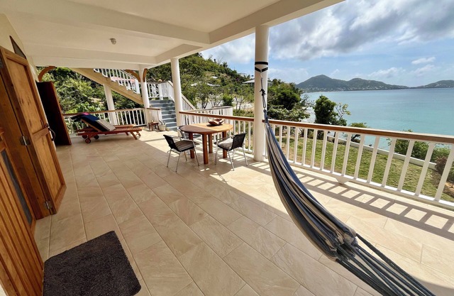 Tranquility Oceanfront Apartment, Carriacou in a quiet rural residential area.