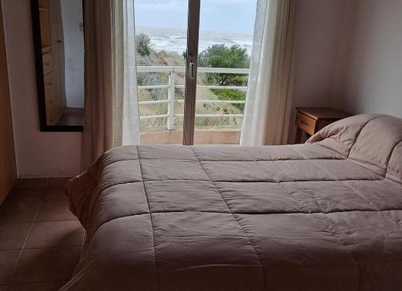 Tranquilo duplex frente al mar