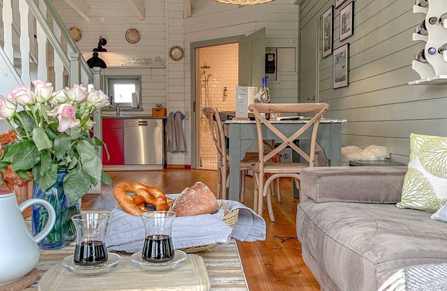 traumHaff Romance de barqueros con chimenea, sauna y barco en Rieth am See