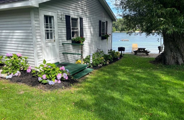 Traverse City's Silver Lake, DIRECT sandy beach waterfront on all sports lake.